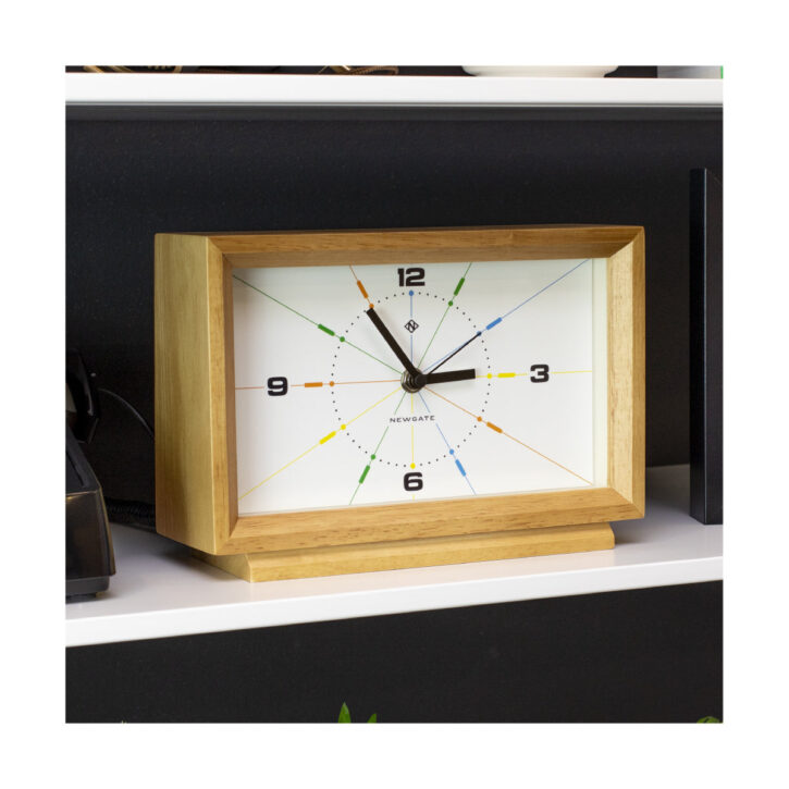 Close up of the solid wood Hollywood Hills mantel clock by Newgate World on a shelf