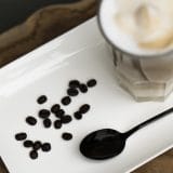 Zwarte krumbel koffie lepel