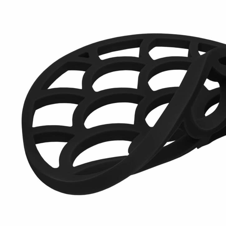 Flexibele onderzetter in het zwart voor pannen